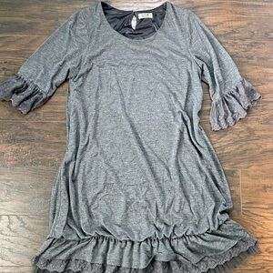 Gray mini dress with layered lace details. Size Medium